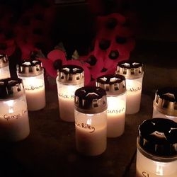 Illuminated remembrance candles bearing the names of the fallen.