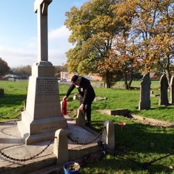 A wreath being laid at the Marston War Memorial.