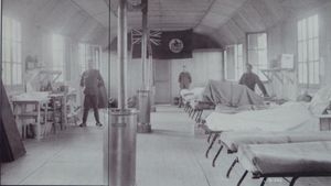 Patients and staff in a military hospital ward.