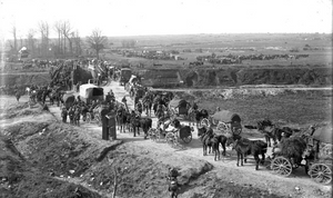 Troops and horse-drawn transport on the march.