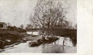 A river in a war-damaged landscape on the Western Front.