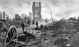 Soldiers and artillery among the ruins of Ypres.