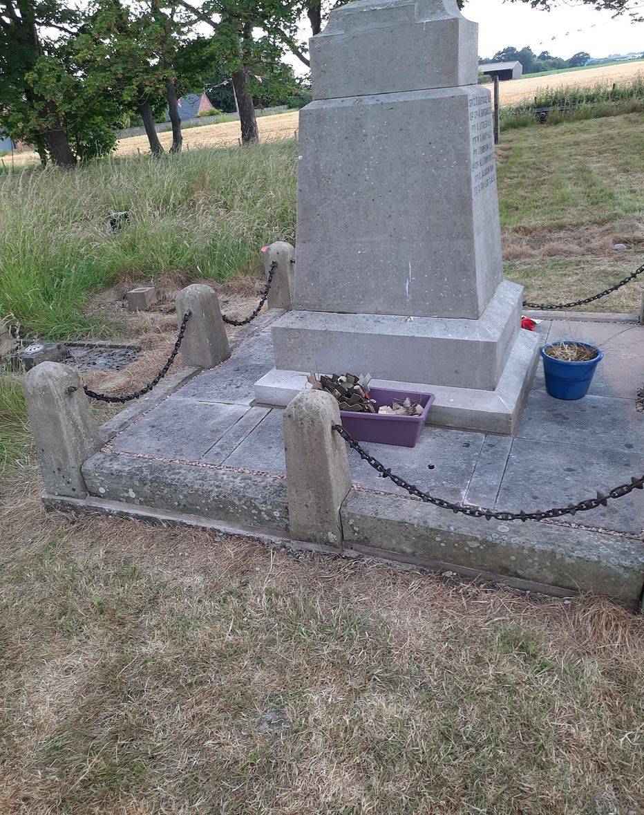 A view of the Marston War Memorial and its repaired base.