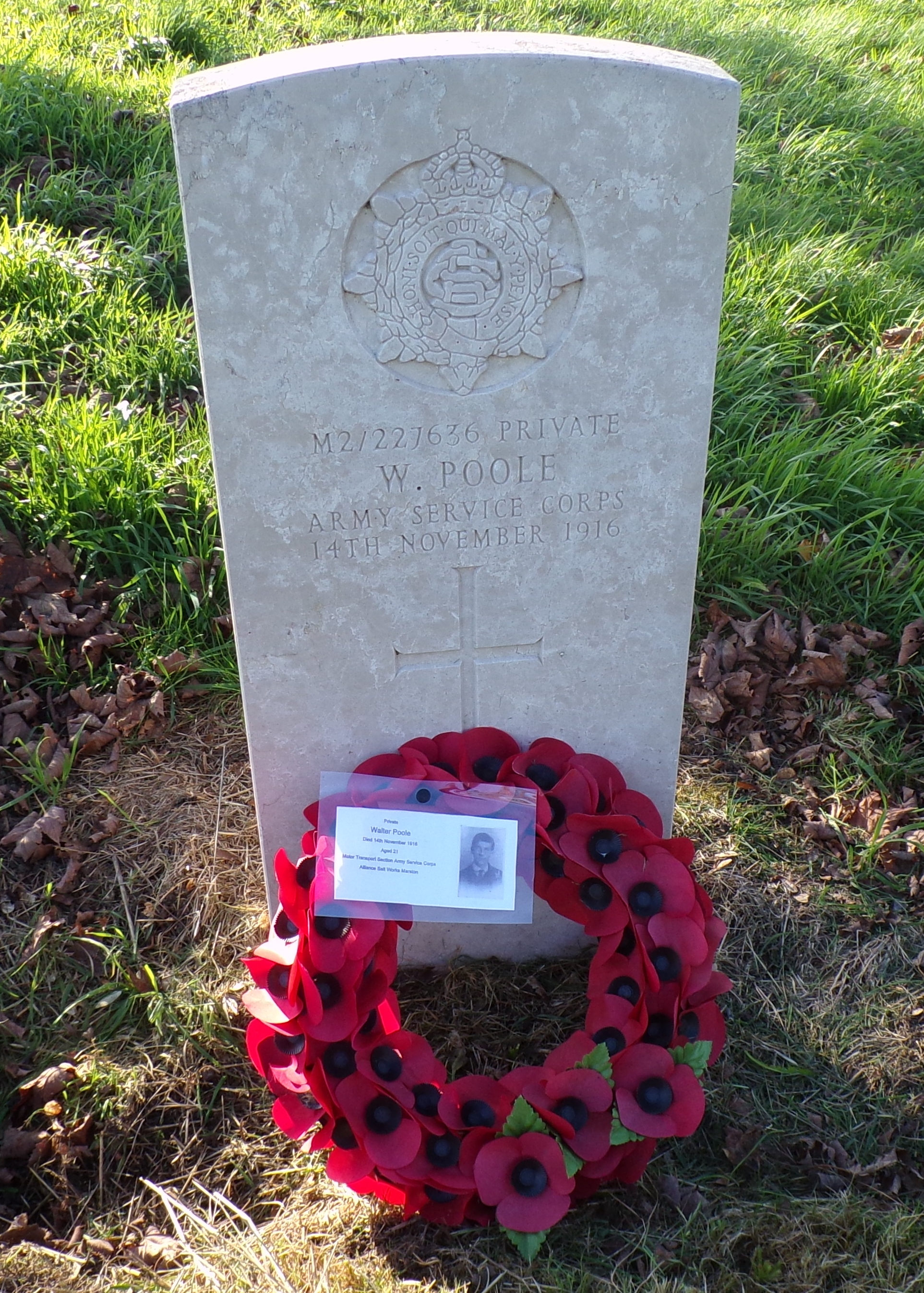 The grave of Walter Poole with a poppy wreath.